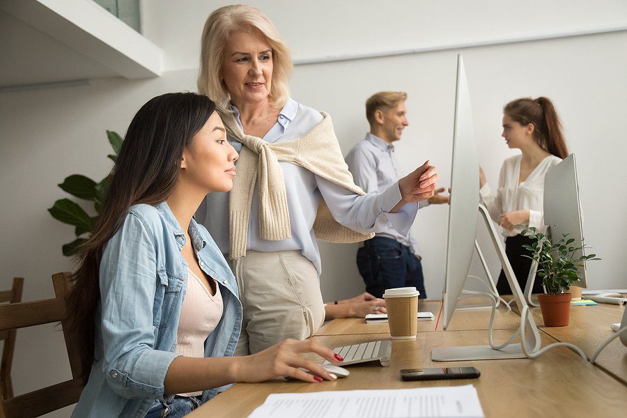 bigstock Aged Female Mentor Training Yo 230327461 Executive Coach Austin